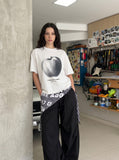 DAXUEN Short-sleeved t-shirt with apple graphic — model photo