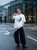 DAXUEN Short-sleeved t-shirt with apple graphic — model photo