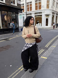 DAXUEN beige cable knit full-zip cardigan — model photo