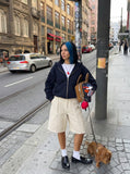 DAXUEN Textured cargo shorts with pockets and a unique pattern — model photo