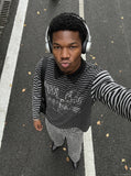 DAXUEN black and grey striped textured graphic polo shirt — model photo