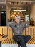 DAXUEN faded grey animal print full-zip jacket — model photo