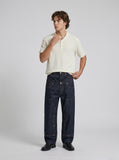 DAXUEN Textured short-sleeve Henley shirt in cream and light grey — model photo