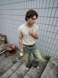 DAXUEN Men's short sleeve knitted sweater with textured knit — model photo