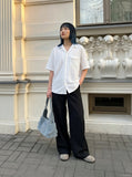 DAXUEN Loose-fitting button-up shirt with camp collar — model photo