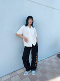 DAXUEN Loose-fitting button-up shirt with camp collar — model photo