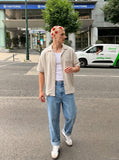 DAXUEN Loose-fitting button-up shirt with camp collar — model photo