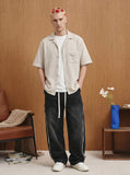 DAXUEN Loose-fitting button-up shirt with camp collar — model photo