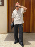 DAXUEN Loose-fitting button-up shirt with camp collar — model photo