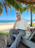 DAXUEN solid white textured open-knit polo shirt — model photo