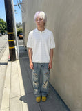 DAXUEN solid white textured open-knit polo shirt — model photo