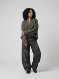 DAXUEN Textured oversized sweater with mock neck — model photo