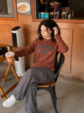 DAXUEN rust brown and black color block sweatshirt with graphic — model photo