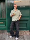 DAXUEN Textured short-sleeved button-up shirt in sage green — model photo