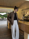 DAXUEN grey marled textured wide-leg knit pants — model photo