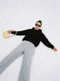 DAXUEN grey marled textured wide-leg knit pants — model photo