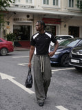 DAXUEN grey textured wide-leg striped pants — model photo