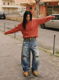 DAXUEN Distressed wide-leg jeans with tiger stripe pattern — model photo