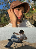 DAXUEN Distressed wide-leg jeans with tiger stripe pattern — model photo