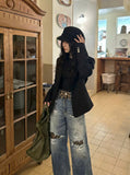DAXUEN Distressed wide-leg jeans with tiger stripe pattern — model photo