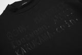 DAXUEN black mock neck top with tone-on-tone graphic