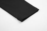 DAXUEN black mock neck top with tone-on-tone graphic