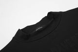 DAXUEN black mock neck top with tone-on-tone graphic
