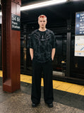 DAXUEN washed grey/brown tribal embroidered oversized t-shirt — model photo