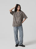 DAXUEN washed grey/brown tribal embroidered oversized t-shirt — model photo