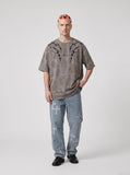 DAXUEN washed grey/brown tribal embroidered oversized t-shirt — model photo