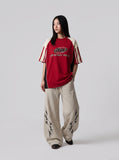 DAXUEN light beige tribal graphic balloon-leg sweatpants — model photo