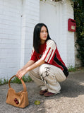 DAXUEN light beige tribal graphic balloon-leg sweatpants — model photo