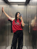 DAXUEN light beige tribal graphic balloon-leg sweatpants — model photo