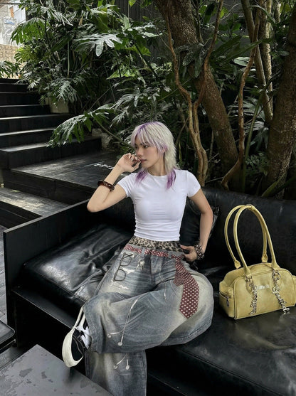 DAXUEN High-waisted wide-leg trousers with trompe l'oeil design — model photo