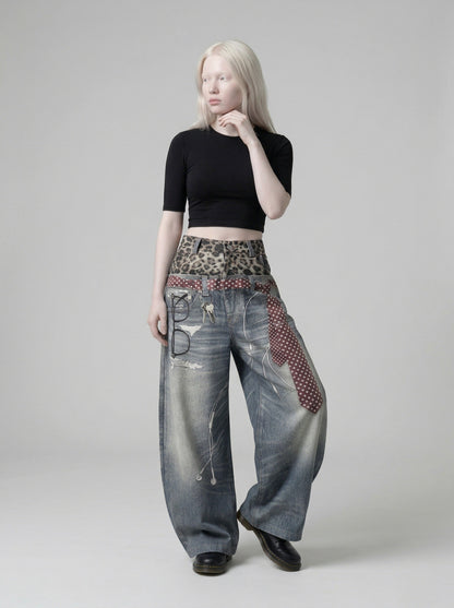 DAXUEN High-waisted wide-leg trousers with trompe l'oeil design — model photo