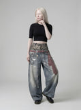DAXUEN High-waisted wide-leg trousers with trompe l'oeil design — model photo