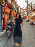 DAXUEN Two-tone oversized wide leg pants for men — model photo