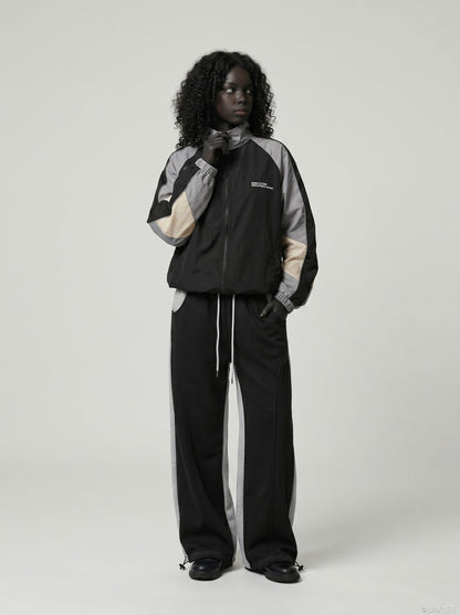 DAXUEN Two-tone loose-fit sweatpants with adjustable drawstrings — model photo