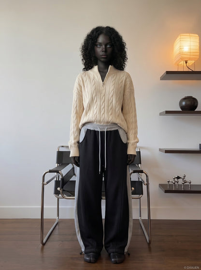 DAXUEN Two-tone loose-fit sweatpants with adjustable drawstrings — model photo