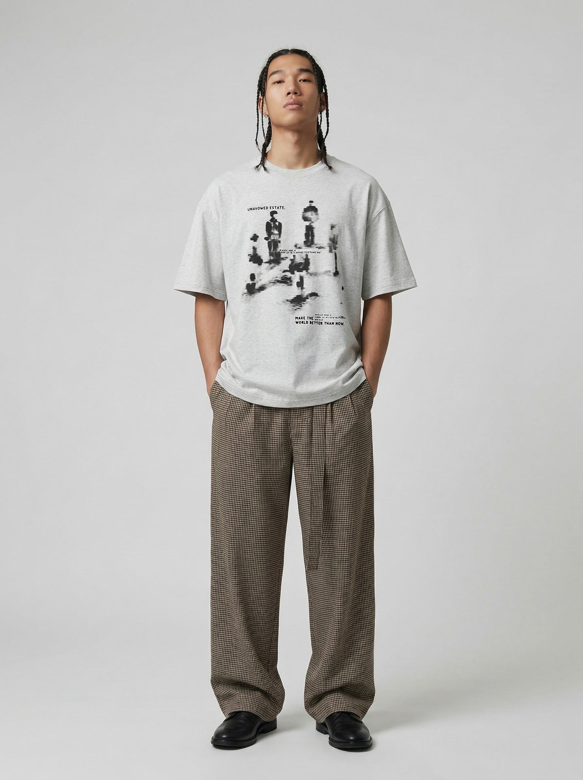DAXUEN Oversized graphic T-shirt with human figures and text — model photo