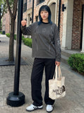 DAXUEN Long sleeve crew neck t-shirt with graphic print — model photo