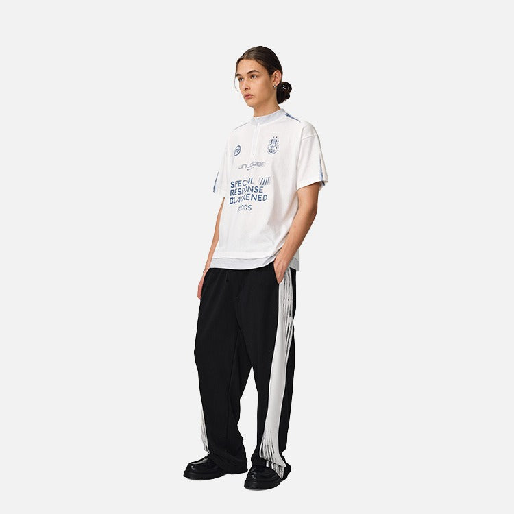 DAXUEN Unloose graphic quarter-zip t-shirt — model photo