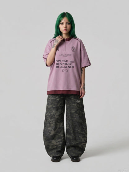 DAXUEN Relaxed oversized quarter-zip graphic t-shirt — model photo