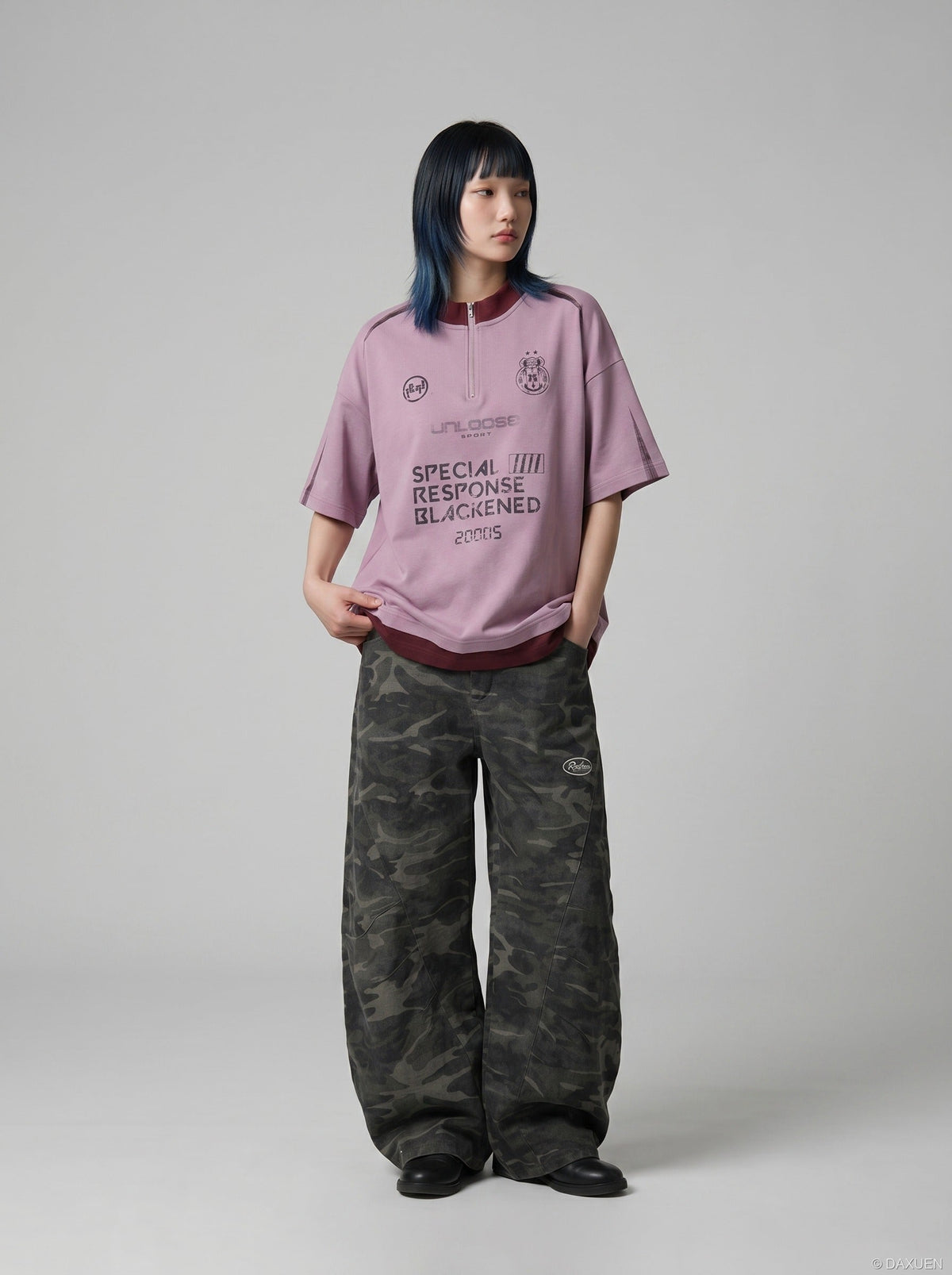 DAXUEN Relaxed oversized quarter-zip graphic t-shirt — model photo