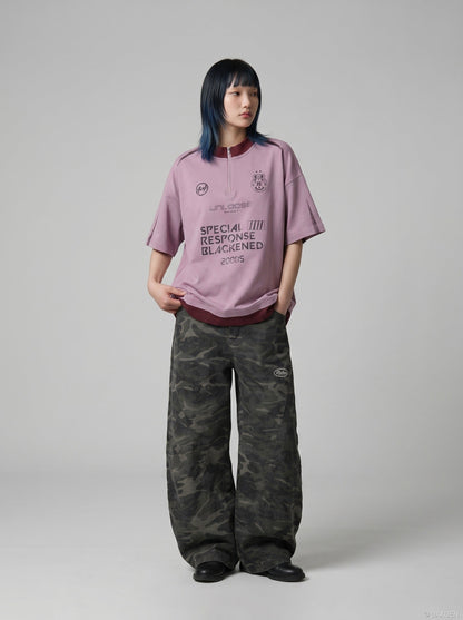 DAXUEN Relaxed oversized quarter-zip graphic t-shirt — model photo