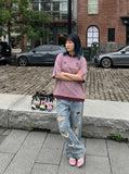 DAXUEN Relaxed oversized quarter-zip graphic t-shirt — model photo