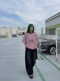 DAXUEN Relaxed oversized quarter-zip graphic t-shirt — model photo