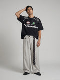 DAXUEN Relaxed fit graphic t-shirt with bold designs — model photo