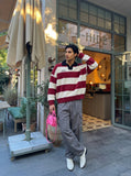 DAXUEN Oversized long-sleeved knit sweater with stripes and embroidery — model photo