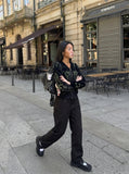 DAXUEN Loose-fit utility trousers in olive green and black — model photo